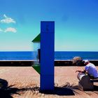 das blaue Strandtelefon, der alte Mann und die Blondine