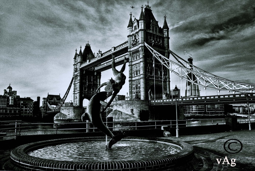 David Wynne's Girl With A Dolphin Statue At Tower Bridge - London.