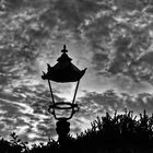Defective old street lamp in evening mood