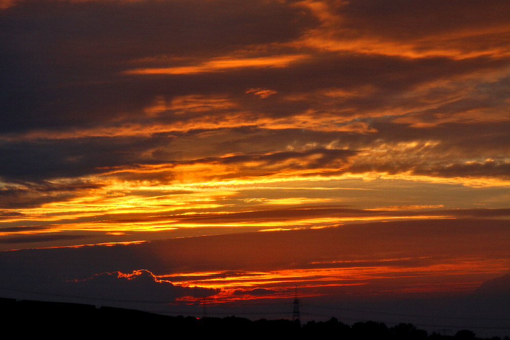 Den prächtigen Sonnenuntergang bis zum letzten Sonnenzipfel...