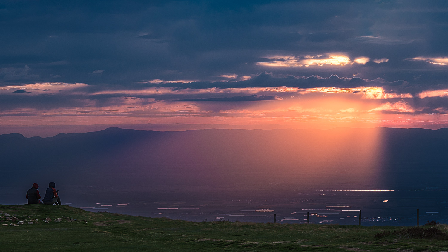 den Sonnenuntergang bewundern