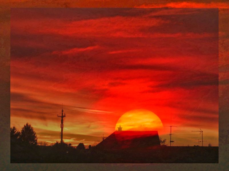 DEN SONNENUNTERGANG DURCH DIE SCHEIBE.....