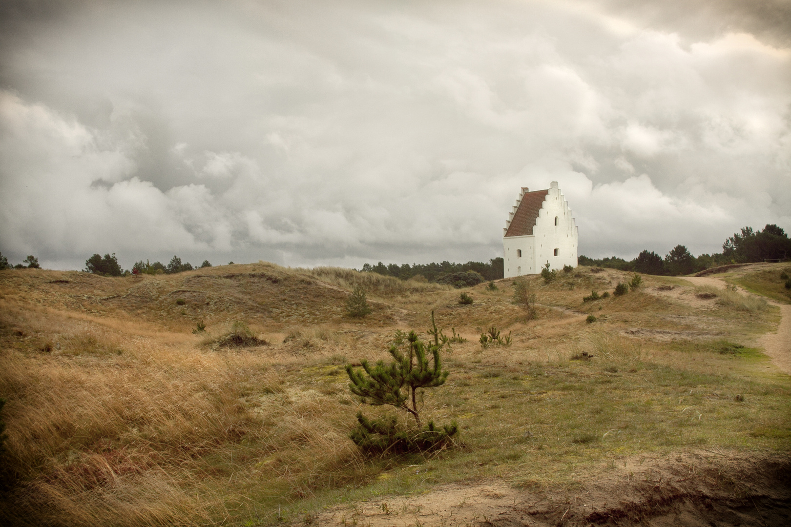 Den Tilsandede Kirke