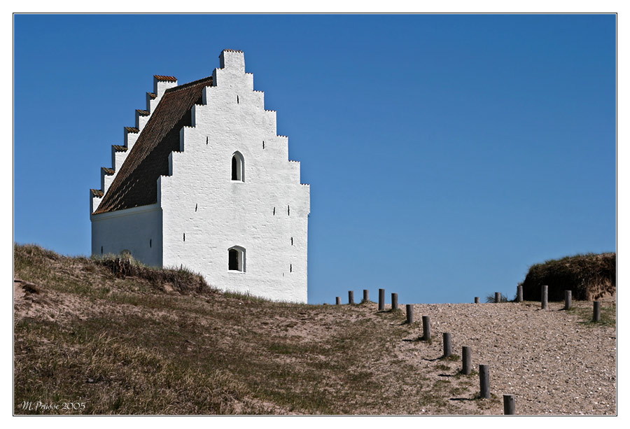 den tilsandende kirke