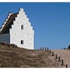 den tilsandende kirke