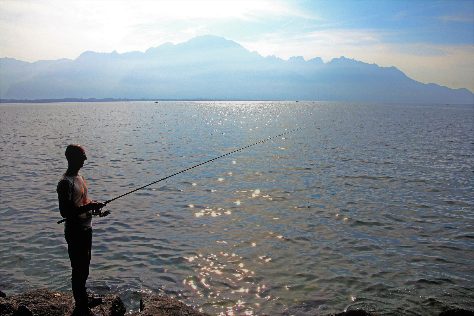 der Angler am  Lac Léman