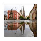 Der Breslau-Dom, am Kopf zwei Zipfelmützen - fiel, platsch, ins Wasser, in die Pfützen