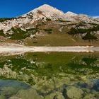 Der Col Bechei 2794 m spiegelt sich im Limosee, der See gehört zu der Gruppe der Fanesseen.... 