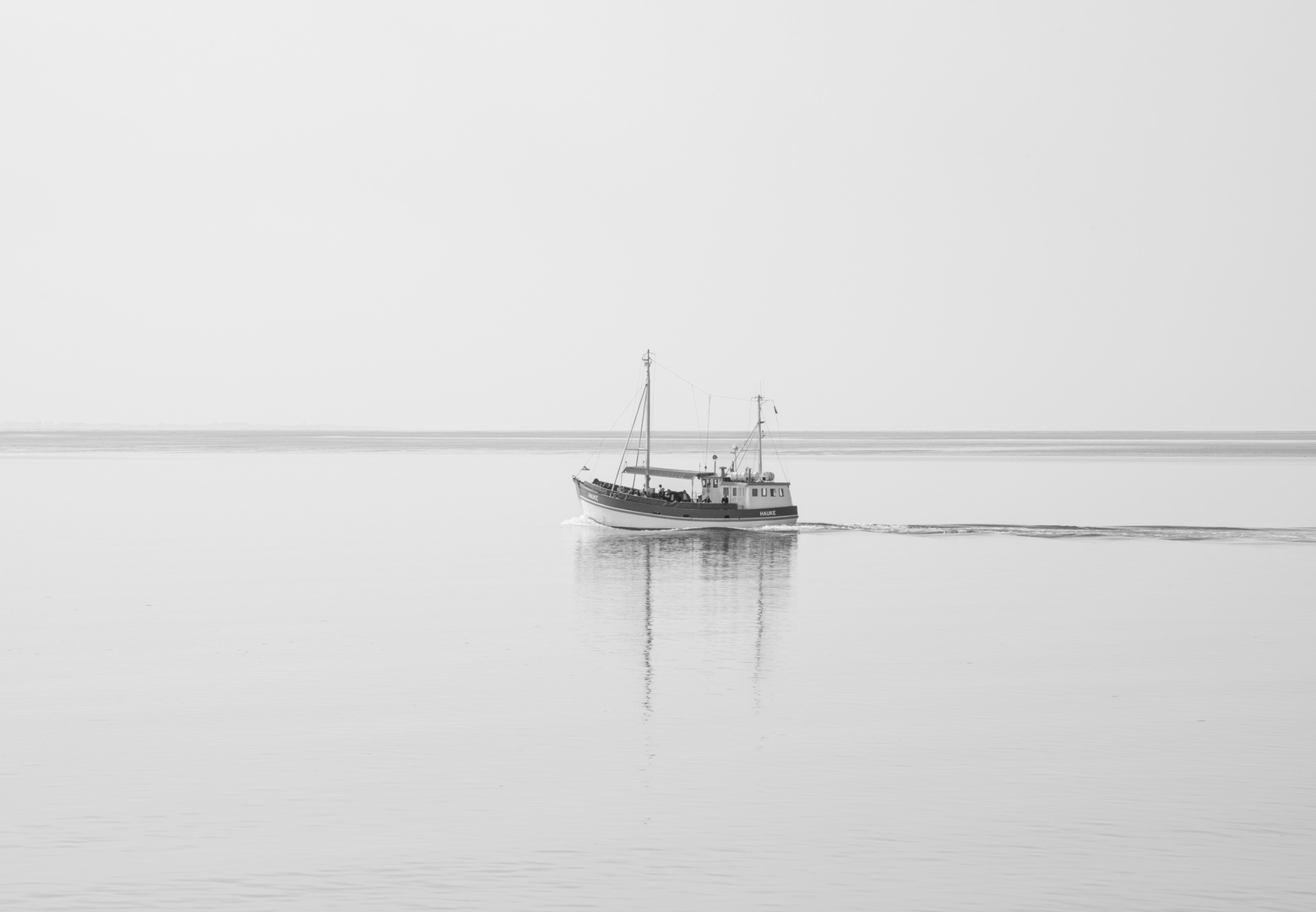 Der einsame Kutter am Meer 