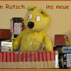 Der gelbe Bär wünscht einen guten Rutsch ins neue Jahr