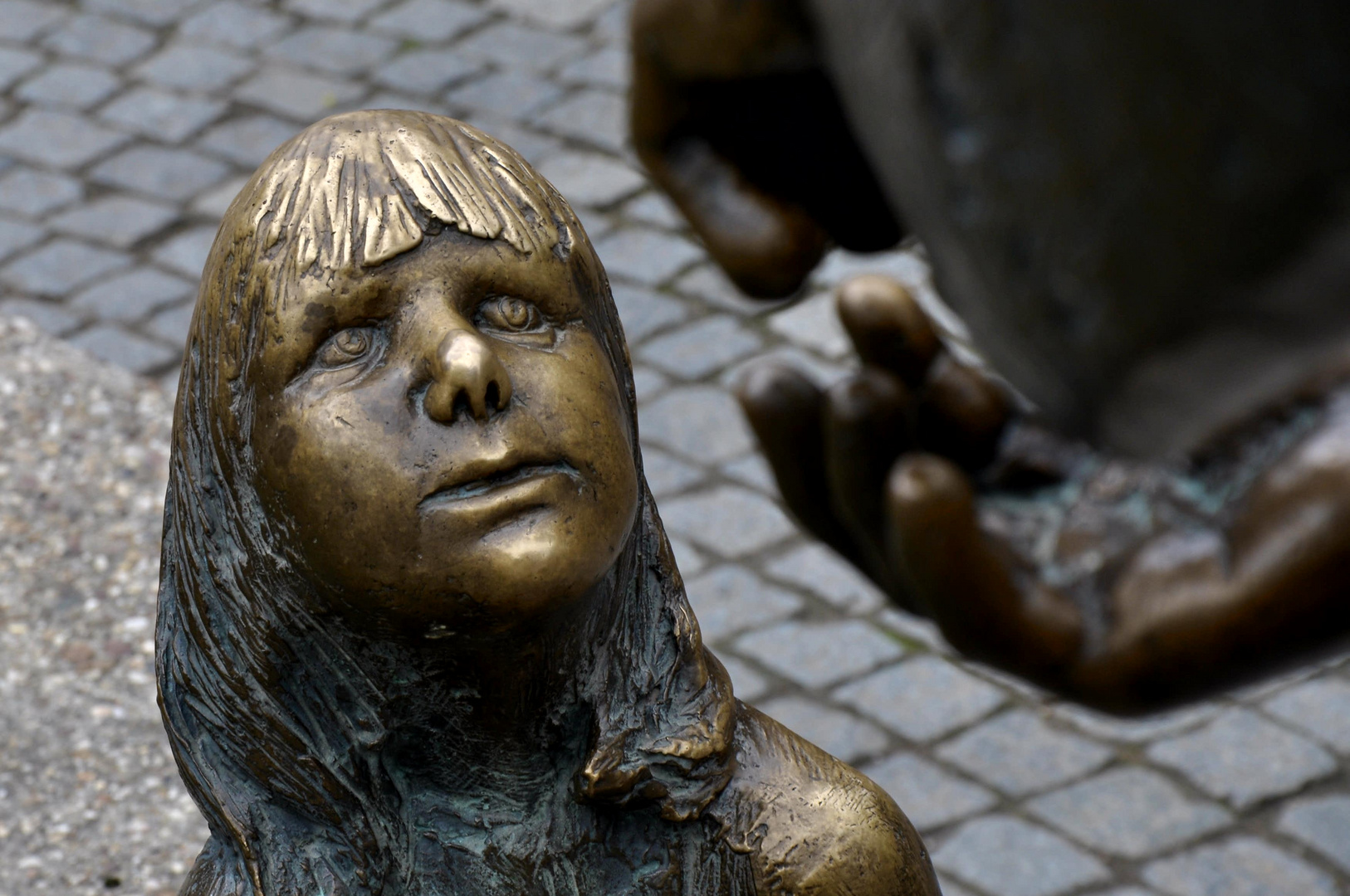 Der Geldbrunnen in Aachen - das Kindergesicht 