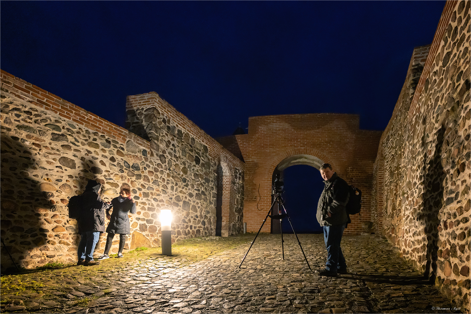 Der Gruppenbildfotograf...