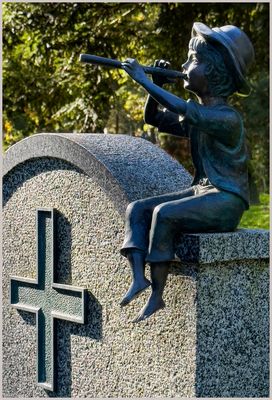 Der kleine Flötist auf dem Friedhof