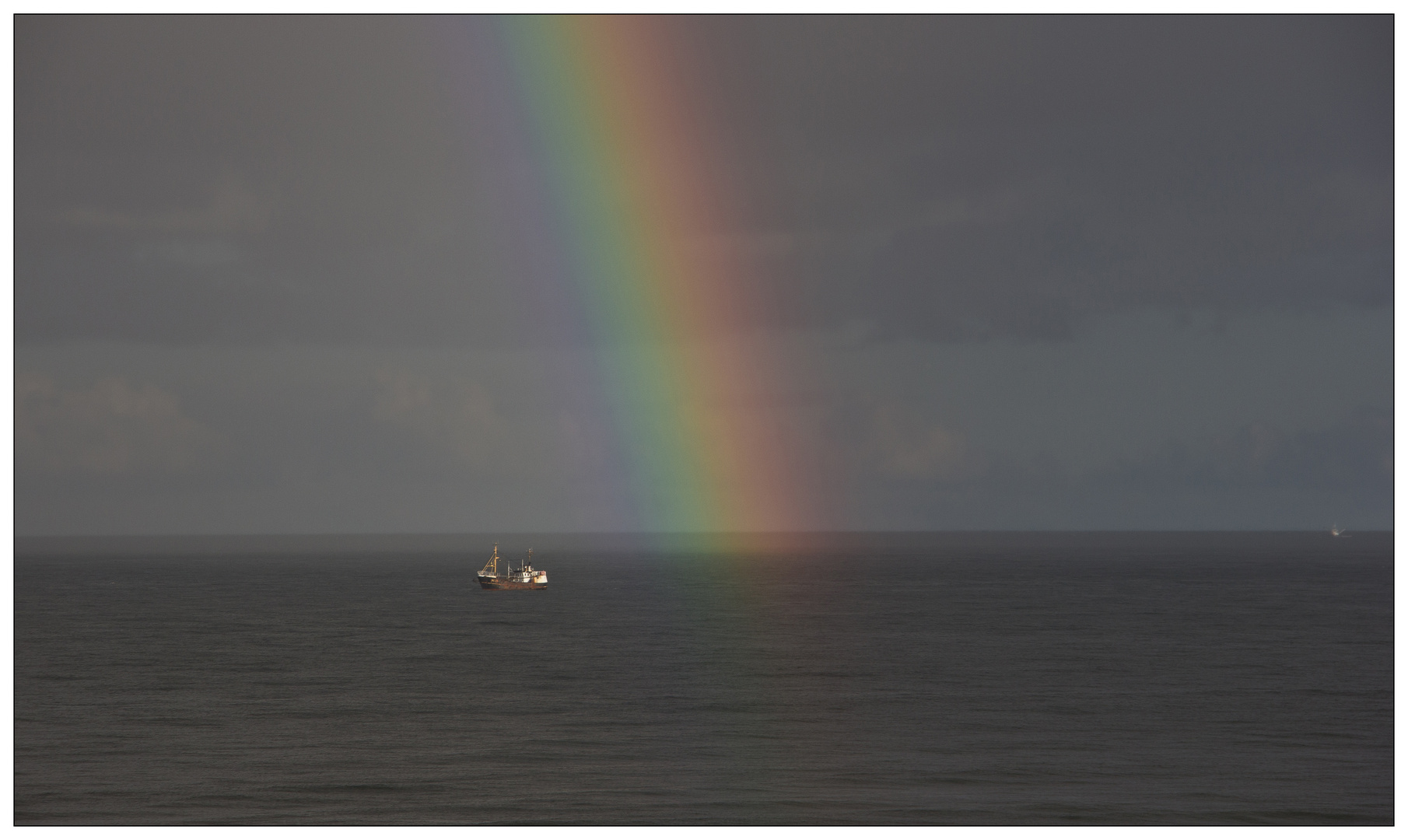 Der Krabbenfischer unterm Regenbogen.