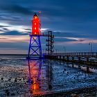 der Leuchtturm Obereversand in Dorum am Abend