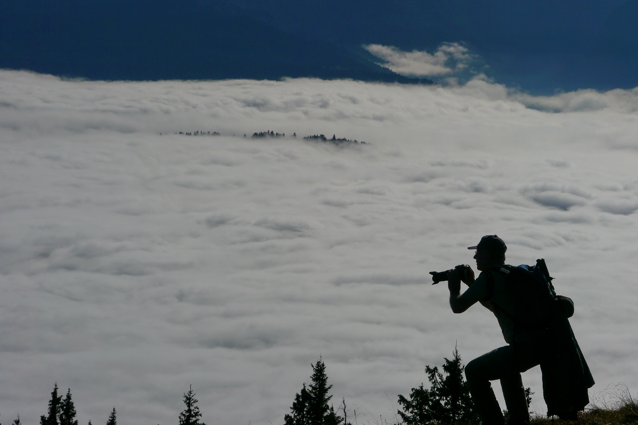 Der Photograph über den Wolken