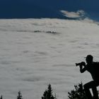 Der Photograph über den Wolken