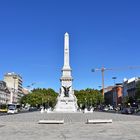 Der Praca dos Restauradores mit dem Obelisk in Lissabon