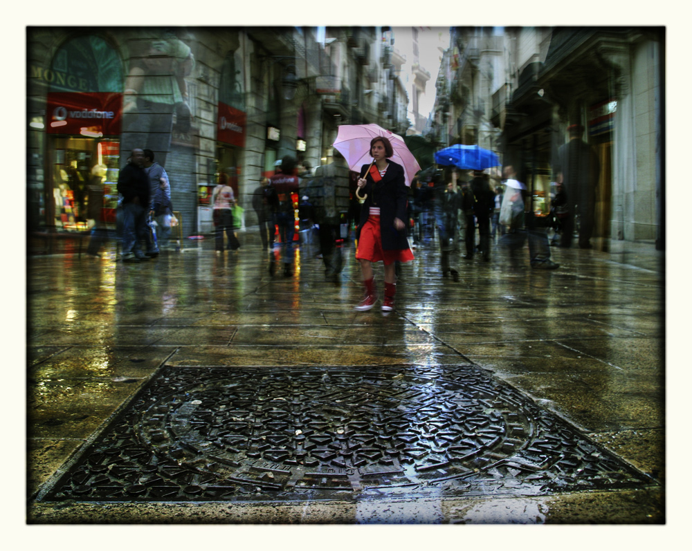 der rosarote Regenschirm.