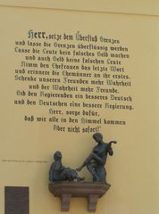 Der Spruch an der Wand