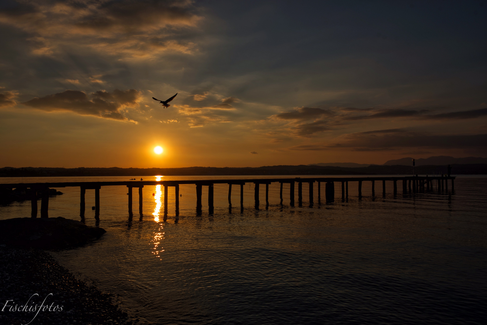 Der Steg in den Sonnenuntergang 