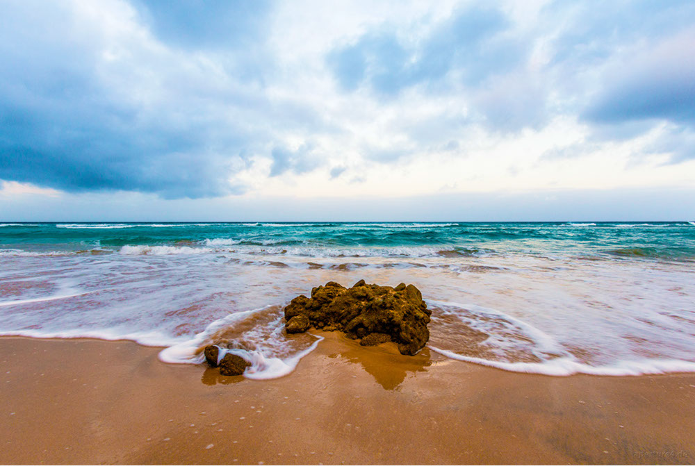 Der Stein am Strand