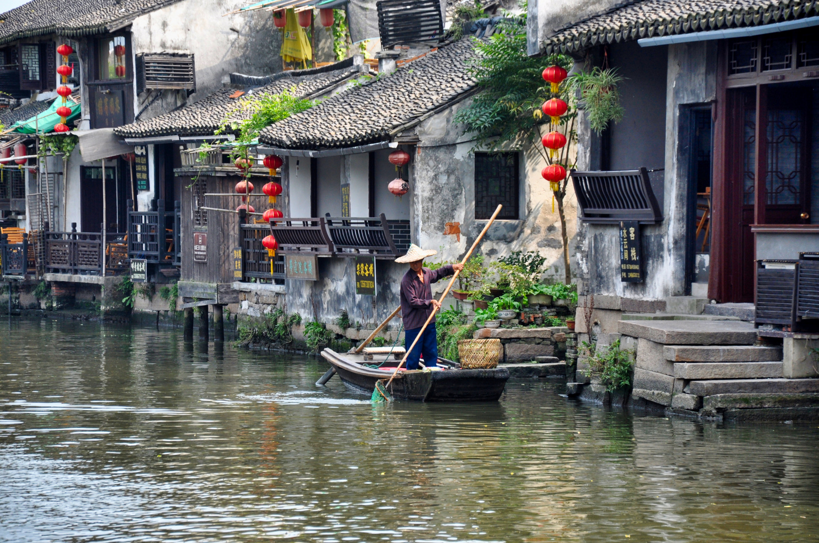 Der Wasserstraßensäuberer - China Xitang