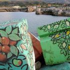 Detalle de dos de los Cubos de la Memoria en el puerto de Llanes (Asturias)