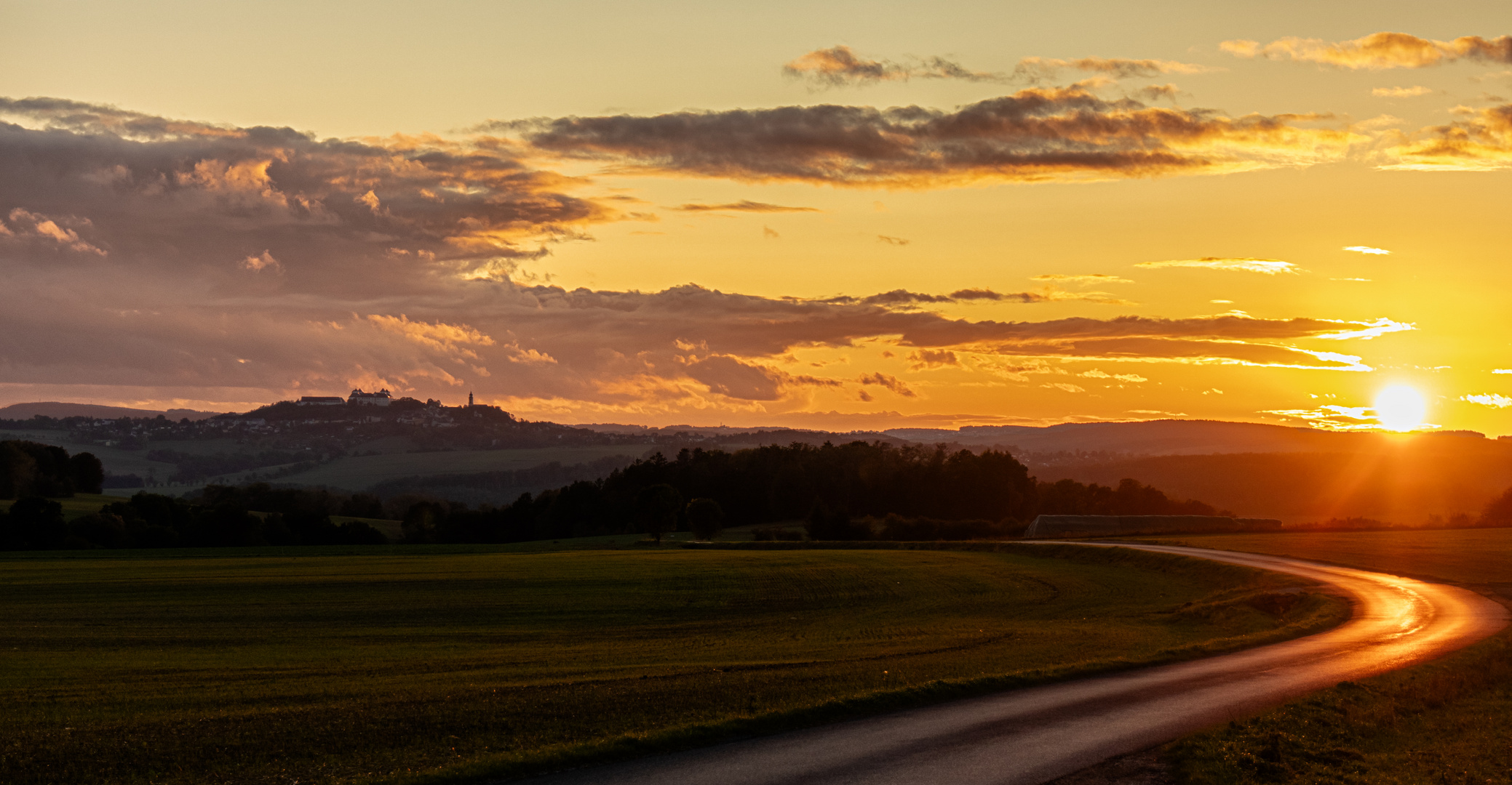 Die Augustusburg im herbstlichen Abendlicht