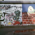 Die bemalte Mauer in den 70er Jahren in Berlin.
