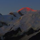 Die ersten Sonnenstrahlen auf dem Mont Blanc, gesehen von der Aiguillette des Houches