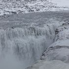 die grau-braunen Wassermassen des Dettifoss