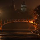 Die Isar in München bei Nacht. Maximilianbrücke (HDR mit Lens Flare).