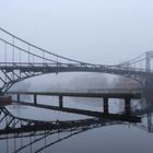 Die Kaiser-Wilhelm Brücke im Nebel
