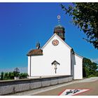 Die Kirche St. Martin oberhalb Warth, mit Mond,