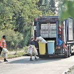 die Männer mit den gelben Säcken