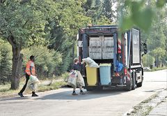 die Männer mit den gelben Säcken