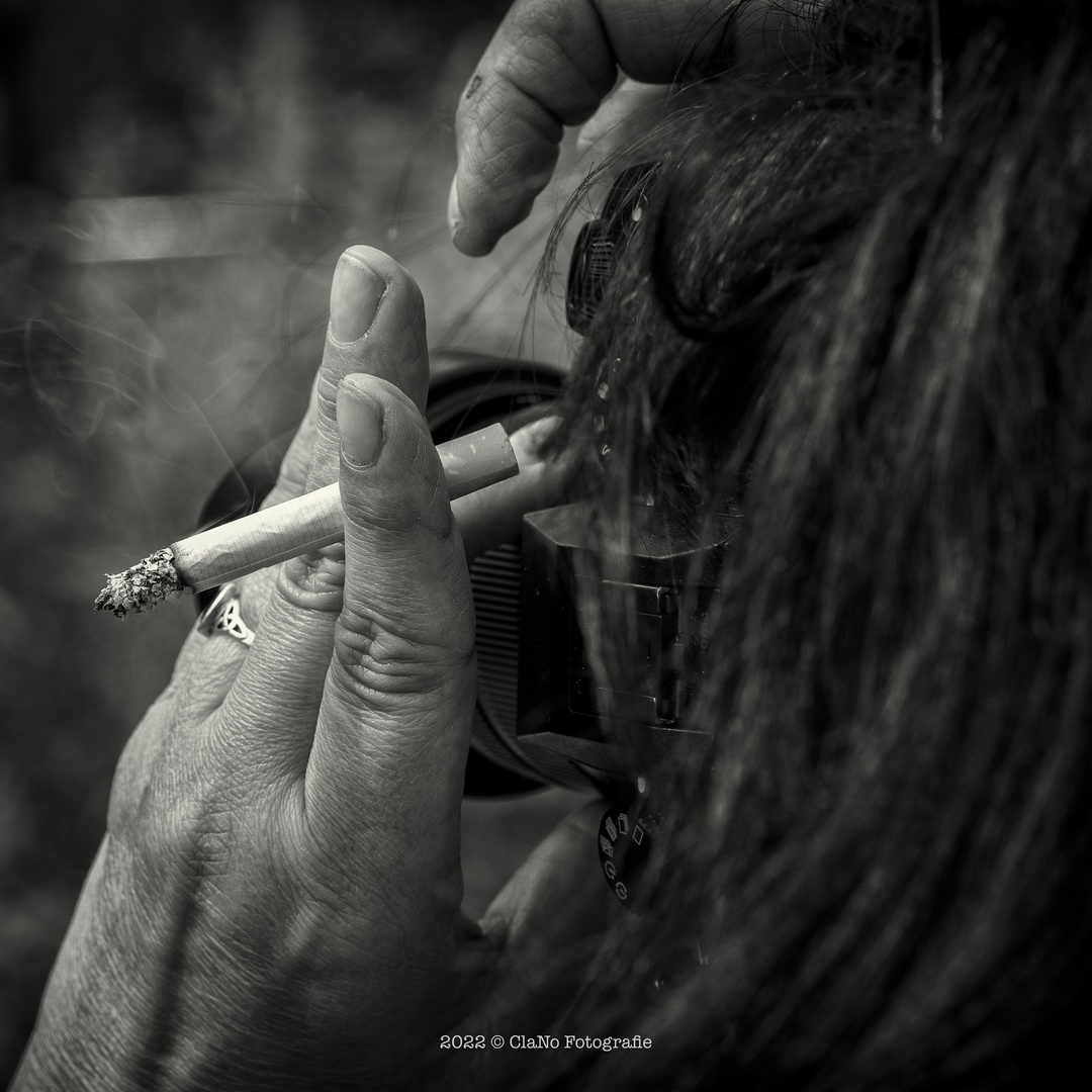 Die Raucherfotografin