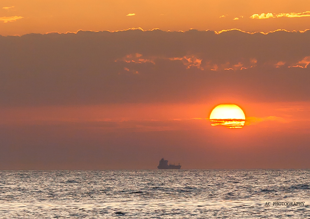 Die Sonne entgegen, Sonnenuntergang an der Nordsee