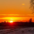 die Sonne geht unter der Mond auf