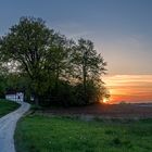 Die Sonne geht unter im Osnabrücker Land an der Grenze zu Westfalen