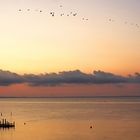 die Sonne kämpft sich durch eine Wolkenwand