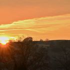 Die Sonne steigt über den Horizont