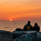 Die Sonne taucht ab vor der Insel Poel