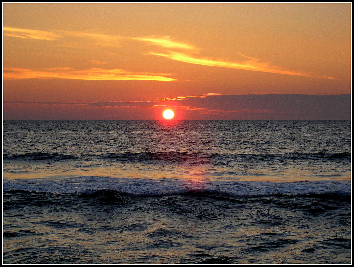 Die Sonne versinkt im Meer