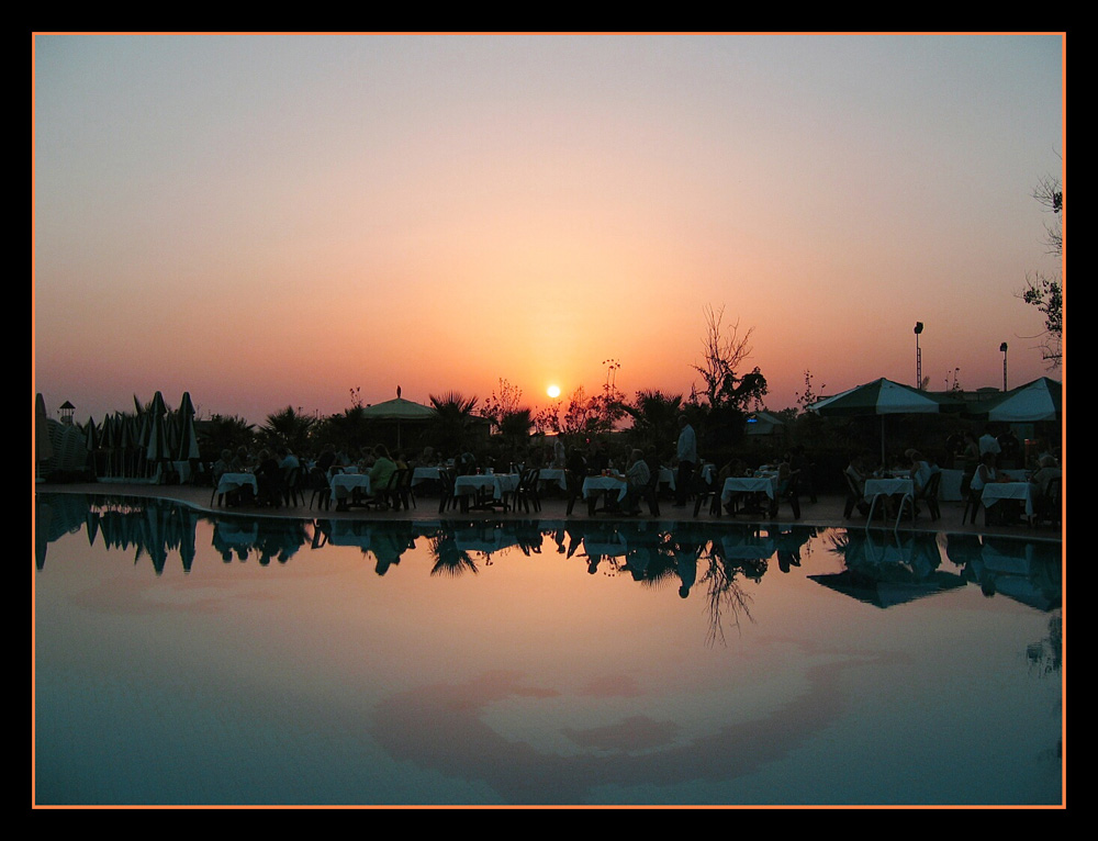 Dinner at the pool by sundown