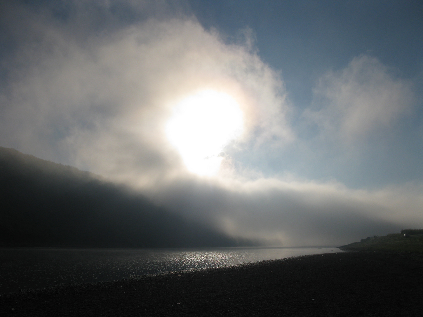 disappearing fog above the river