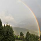 Doppelter Regenbogen über Toblach