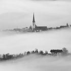 Dorf in den Wolken