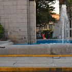 Double bass man and fountain